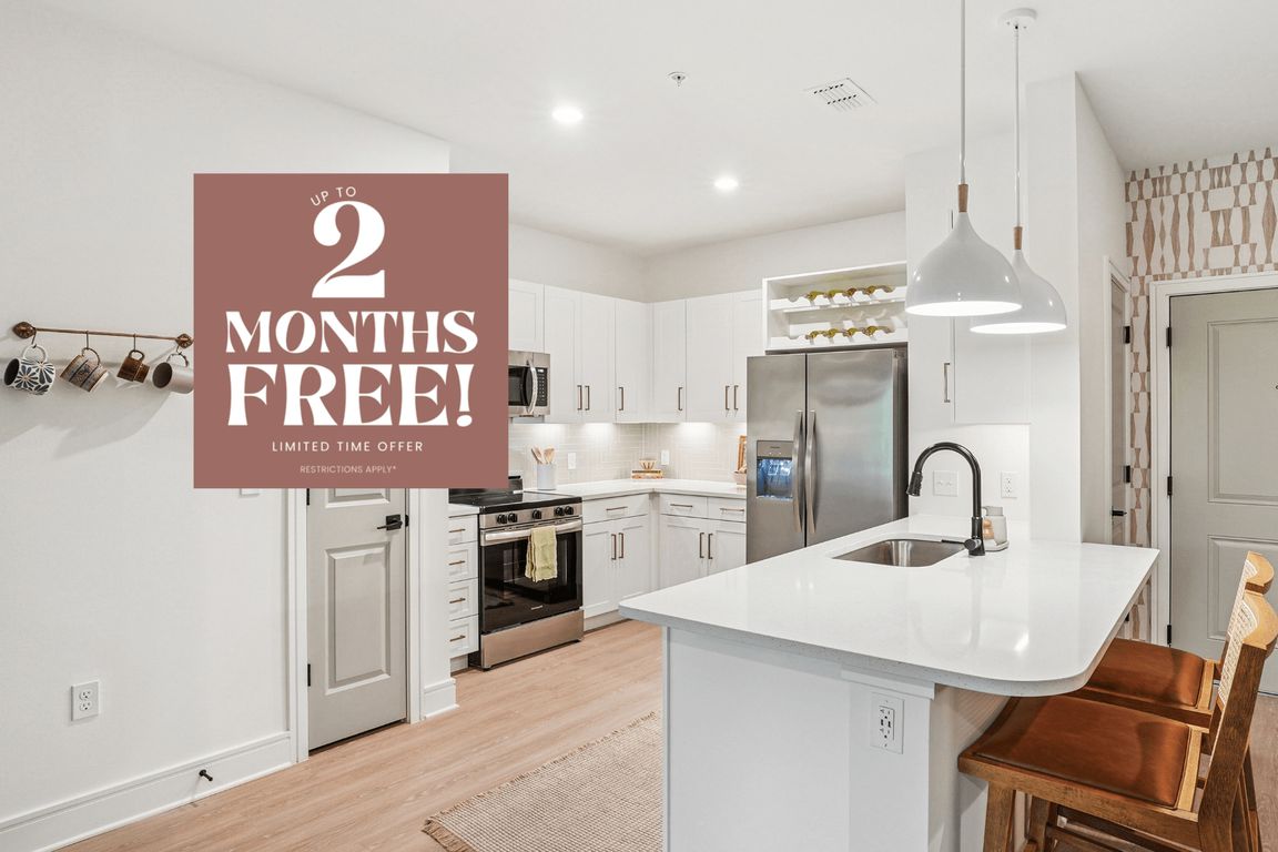 Kitchen with Quartz Countertop and Stainless Steel Appliances