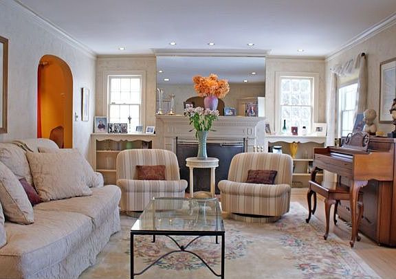 Formal Living Room w/wood floors and wd-burning fireplace