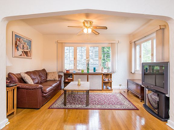 Lovely TV room off LR with traditional archways