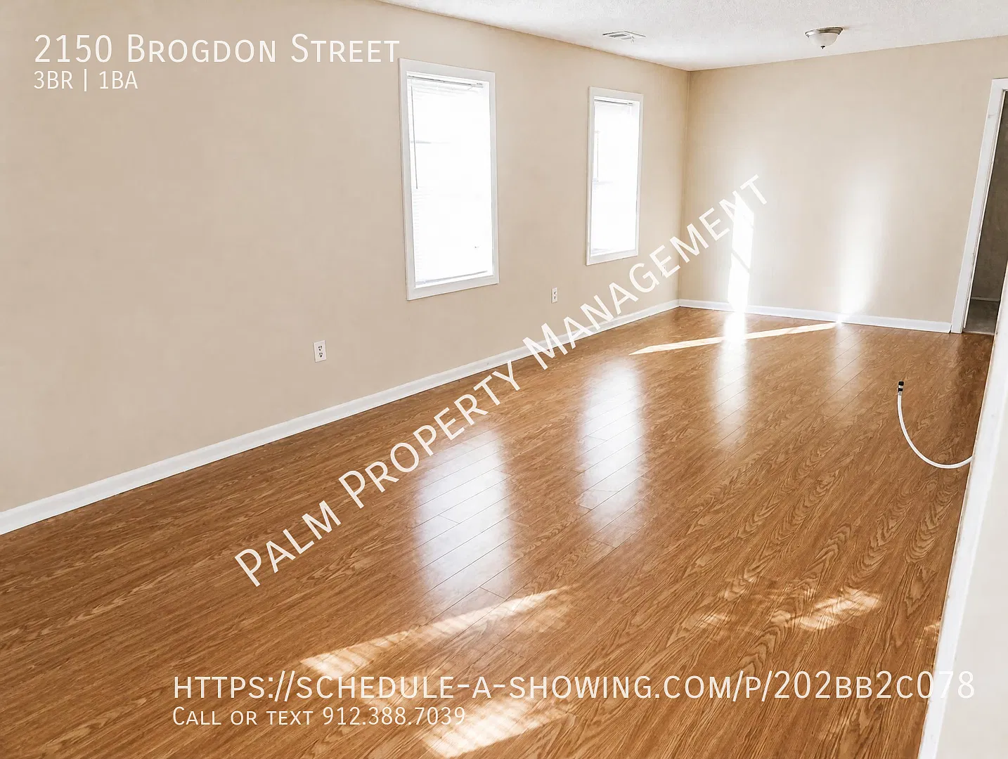 3 Bedroom, 1 Bathroom located in midtown with laminate floors, W/D Hookups and exterior storage! — Photo 2