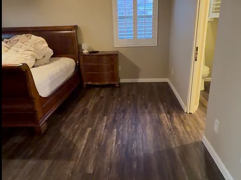 Primary suite; large walk-in closet to the left as you enter the bedroom; private, bonus bedroom to the right; large master bathroom also to the right