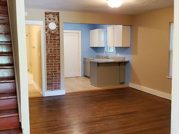 Living Room to Kitchen and Bathroom