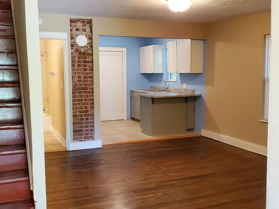 Living Room to Kitchen and Bathroom