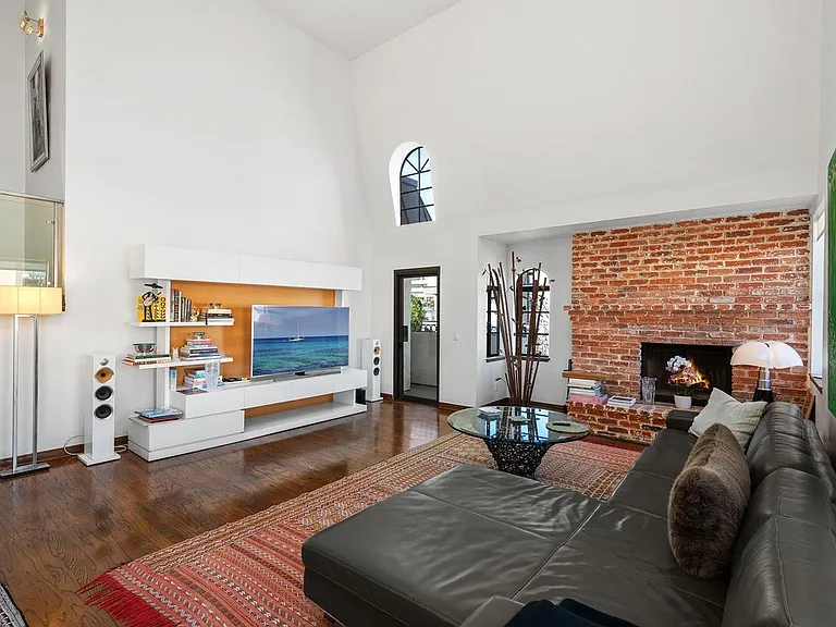 Living room with working wood fire place