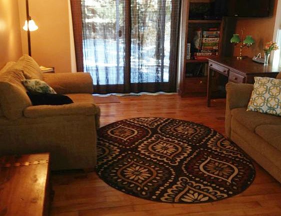 Family room with sliding glass door to the deck