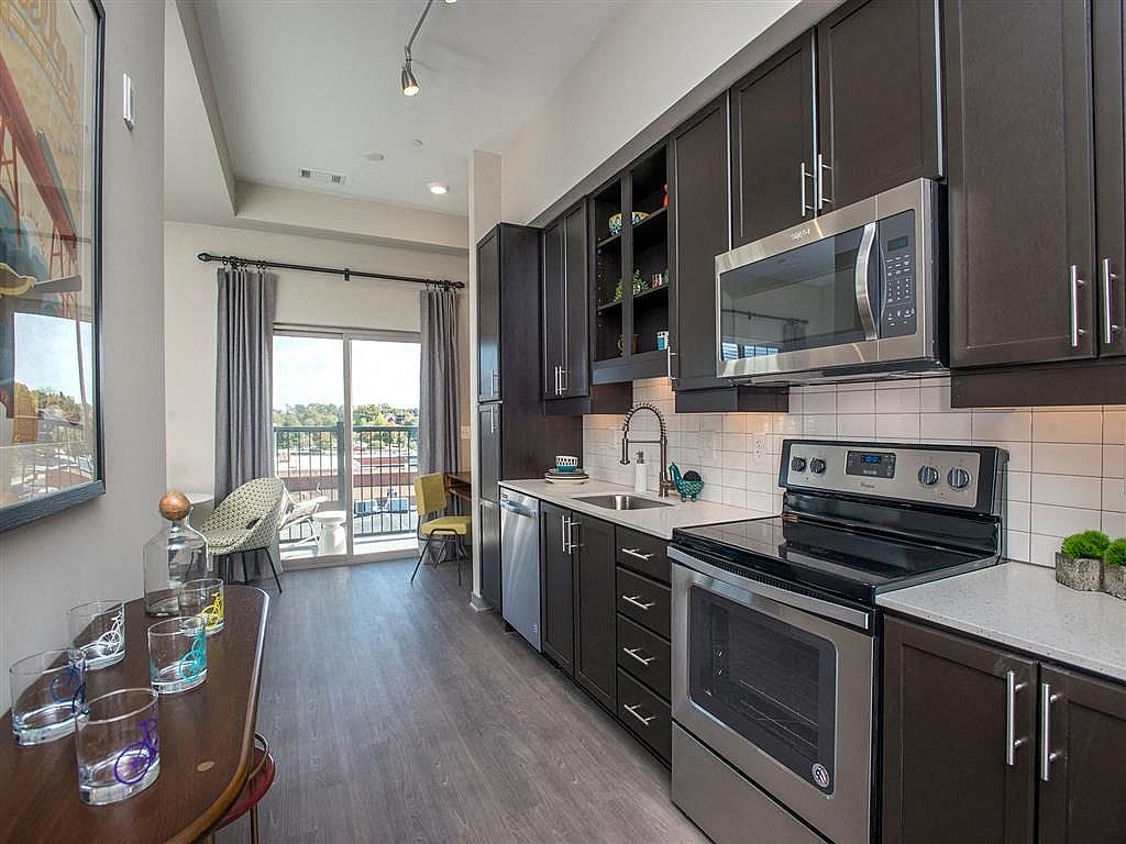 Step into a modern kitchen designed for the urban lifestyle, where style meets functionality.