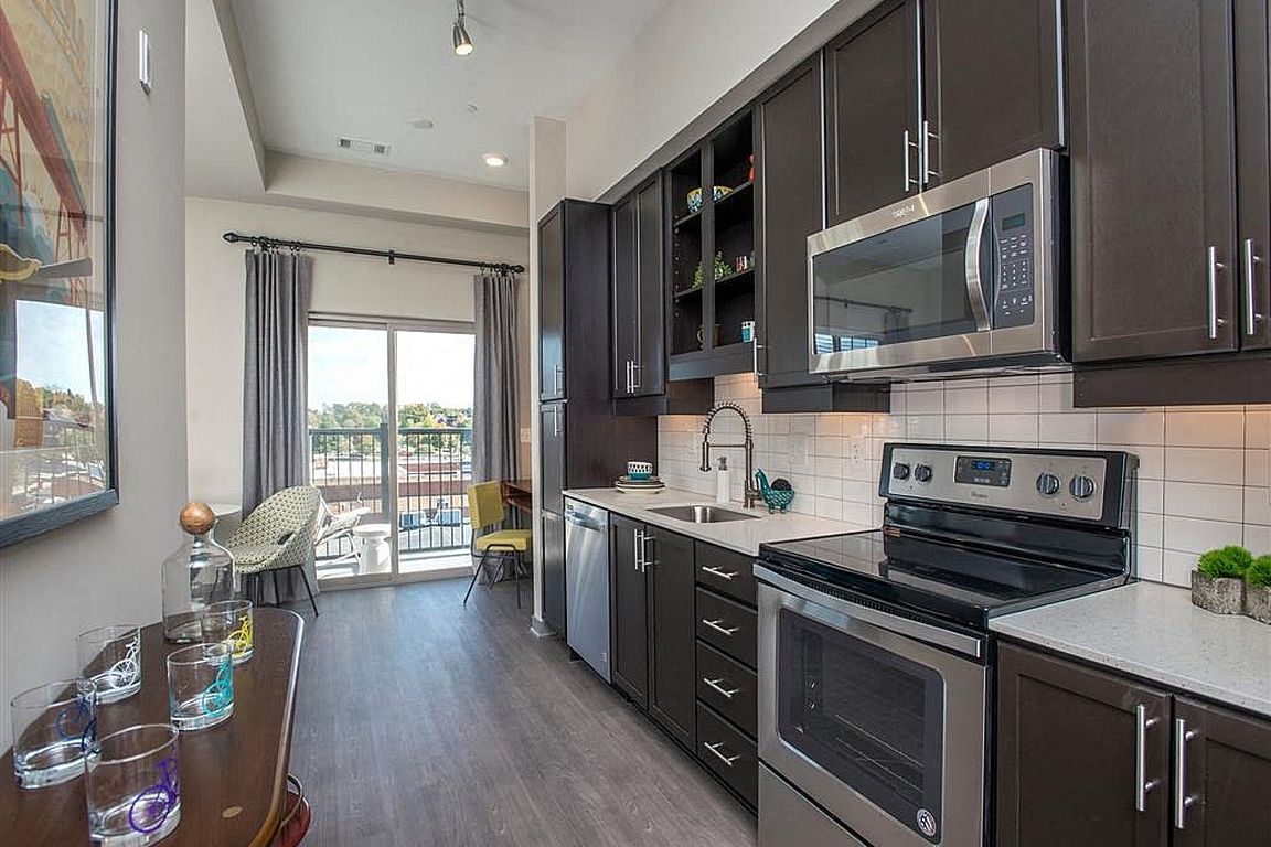 Step into a modern kitchen designed for the urban lifestyle, where style meets functionality.