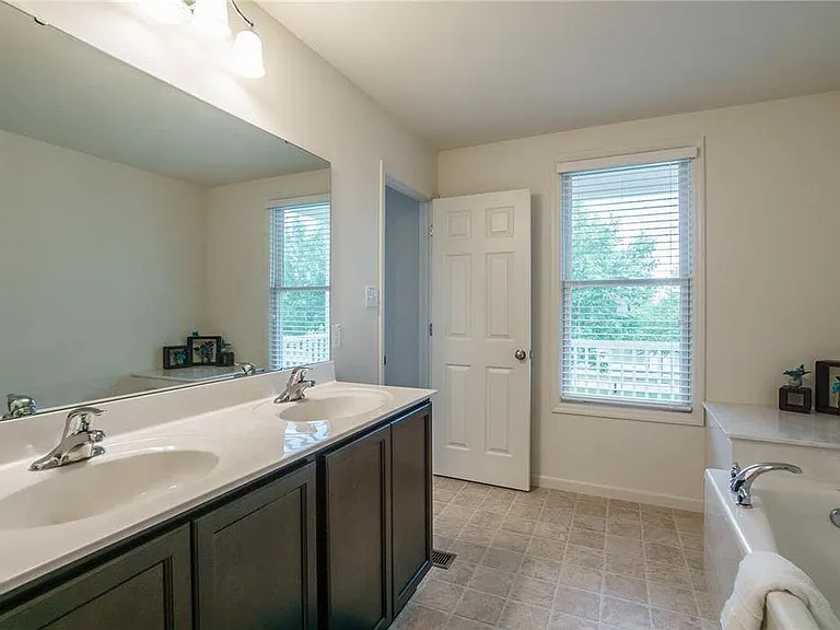 Master Bath... Soak in your Deep Tub Facing the Water