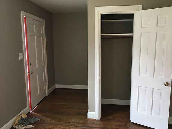 Front door and closet in living room