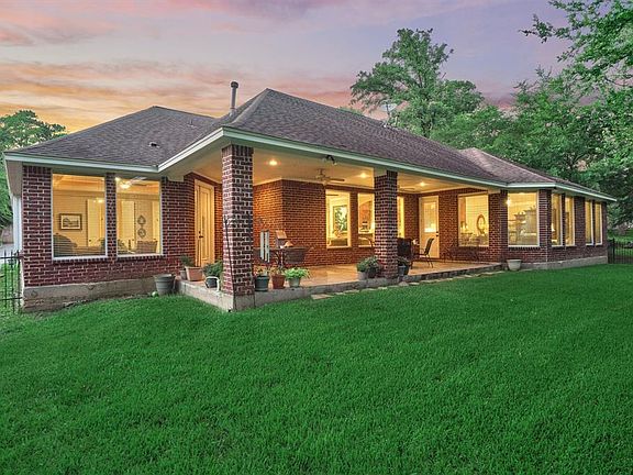 Extend entertainment outdoors on this large covered patio.