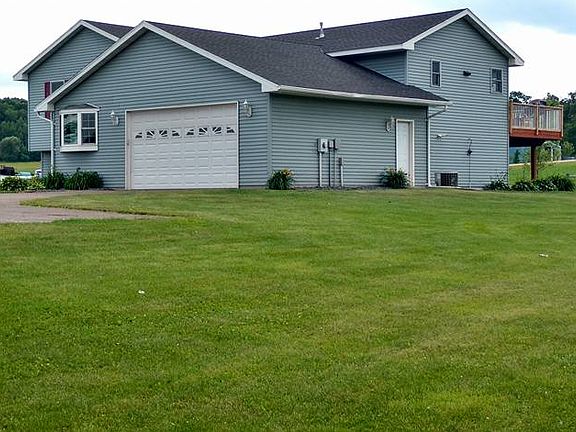 Side view of home and yard