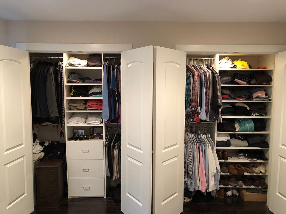 Custom built dual closets to optimize storage space