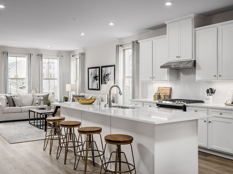 Best value luxury townhomes in Durham with private, wooded homesites near Duke, UNC RTP.