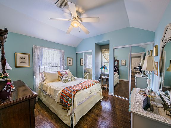 Master bedroom with two doublewide closets.
