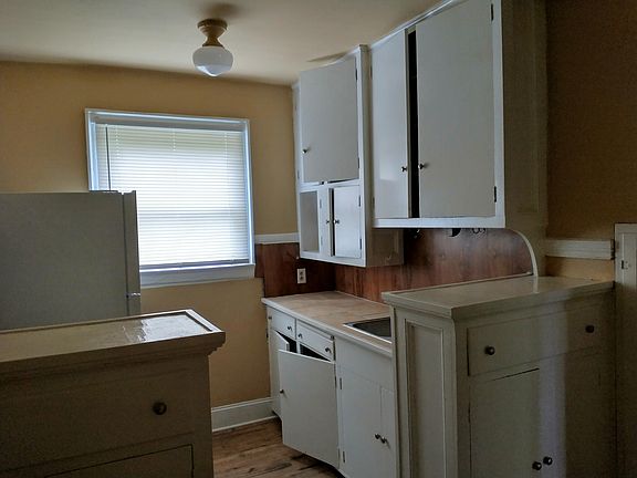 Kitchen, stove and refrigerator