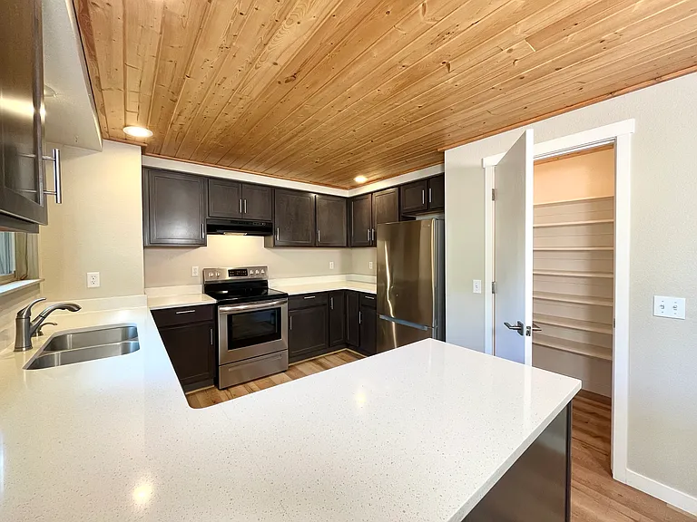 A chef's dream: quartz countertops and limitless storage.