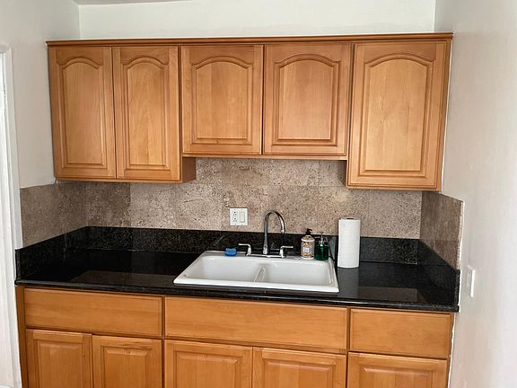 Kitchen space is its own space with a doorway seperate from living space