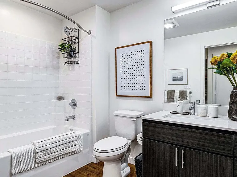 Griffis Shoreline apartment bathroom with quartz countertops.