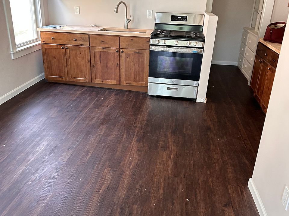 KITCHEN WITH UPDATED APPLIANCE AND CUPBOARD