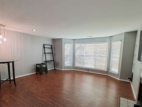 Living room with bay windows
