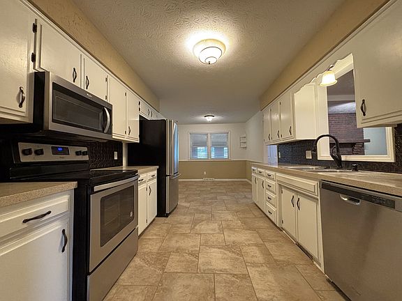 Kitchen view from Flex Space with Breakfast Nook