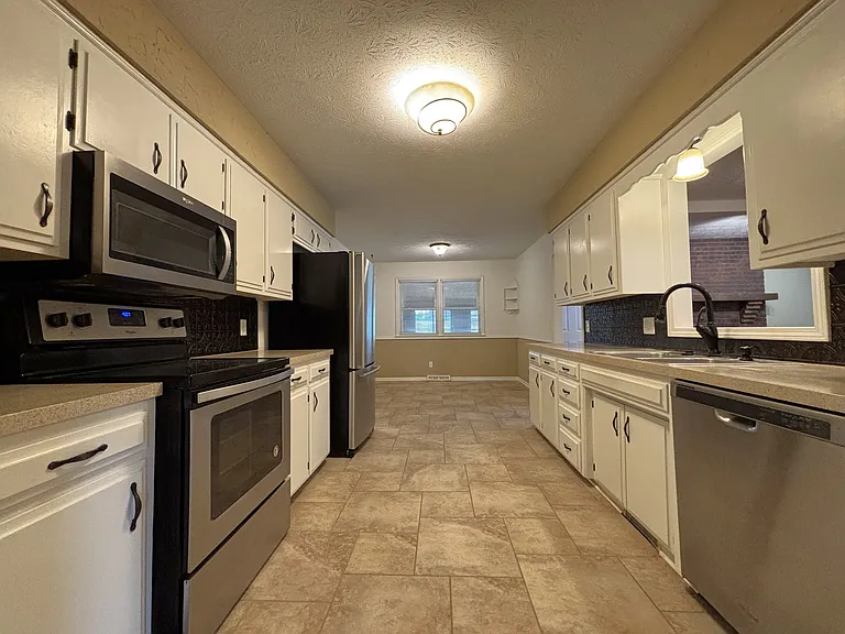 Kitchen view from Flex Space with Breakfast Nook