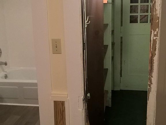 Back porch with storage shelves