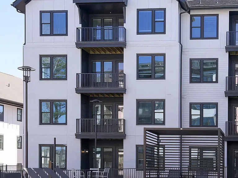 Apartments with balconies overlooking the beautiful pool area