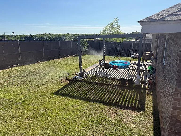 Backyard. Includes pergola with Louvers