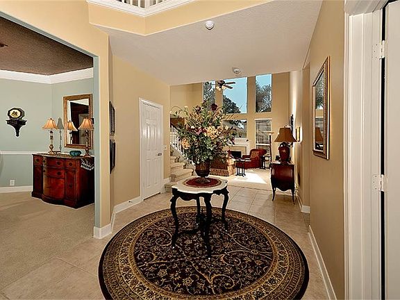 The entry features infuse this home with modern sophistication. The eye is led to the amazing dining room on one side and the exquisite formal living room or study on the other.