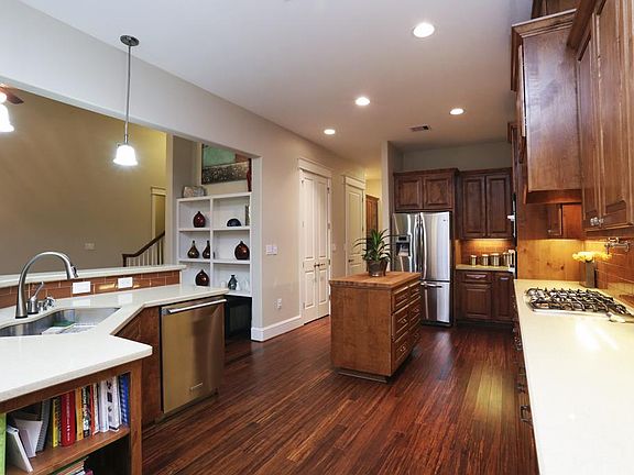 Preparing family meals will be a breeze in this spacious kitchen with tons of counter space. Large center island has drawers for additional storage and is very convenient for meal preparation.