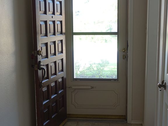 Looking out the screened in front door.