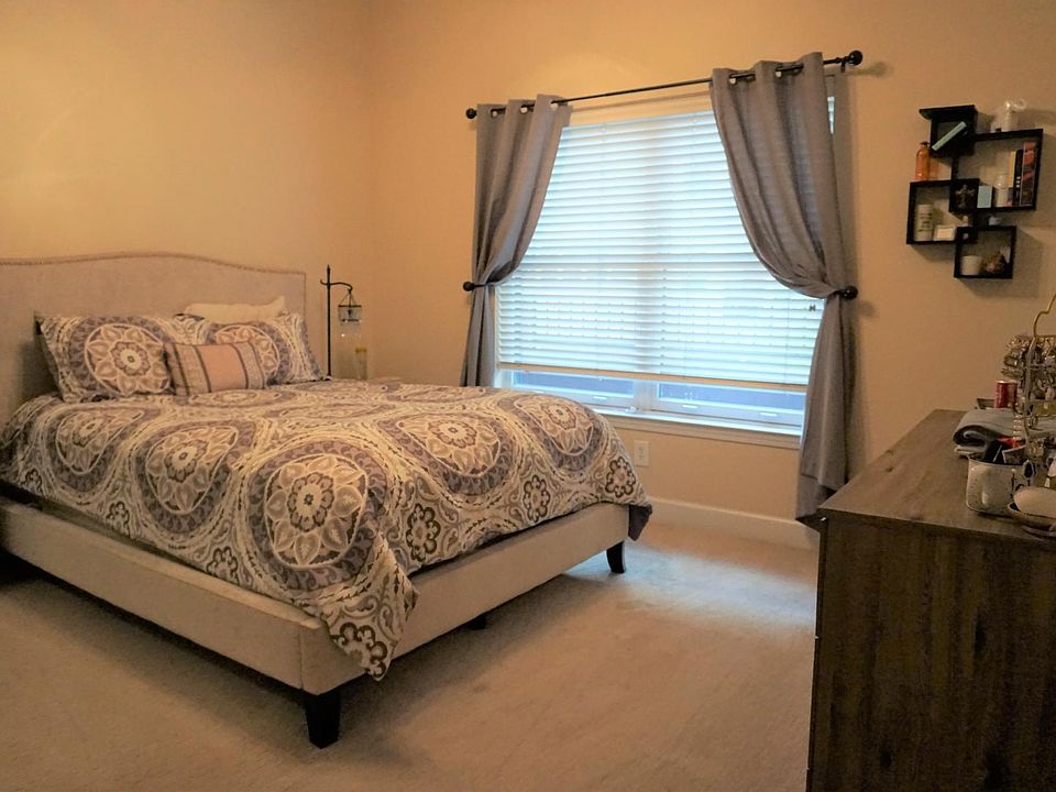 Master bedroom with balcony view