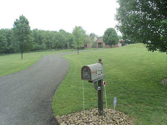 Set back off road
						:
						Newly paved driveway.