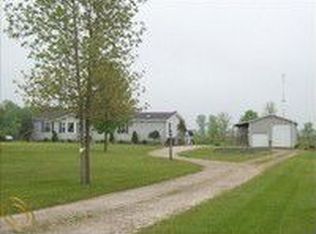 12447 Burt Rd, Riley, MI 48041