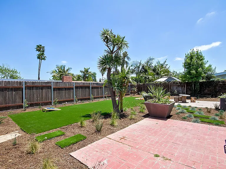 Expansive backyard with patio off living room.