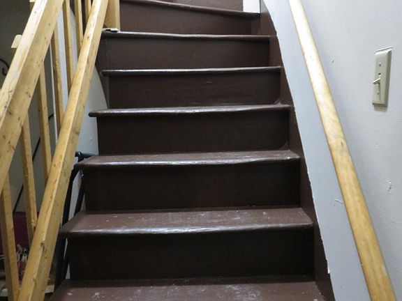 Stairs leading to apartment C