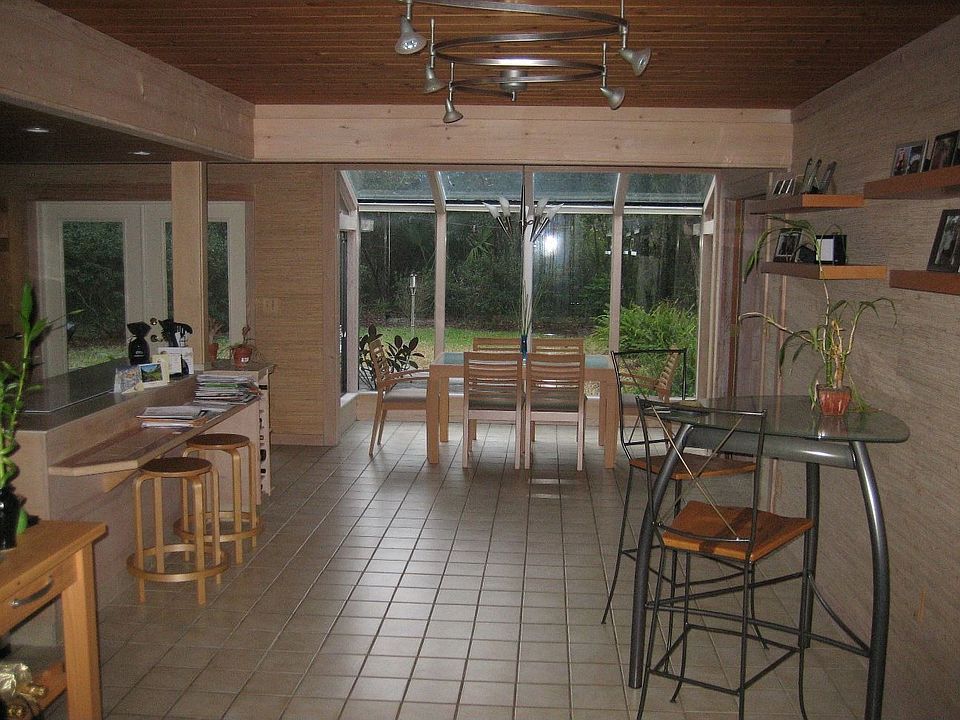 Open plan w/ glass room and garden view