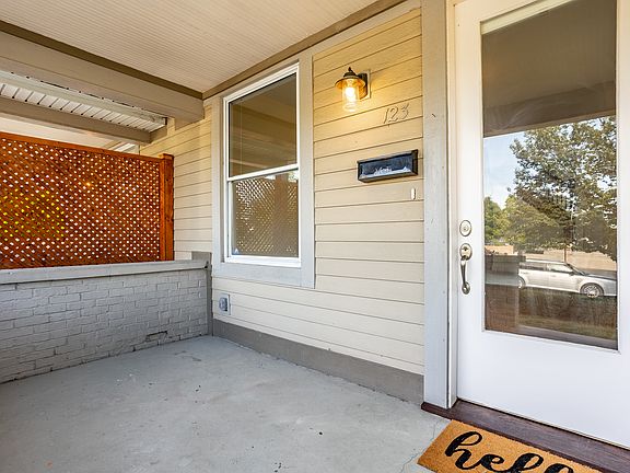 Great covered porch with room to gather and take in the skyline views!