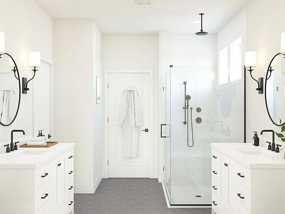 Primary bath with dual vanities and matte black fixtures
