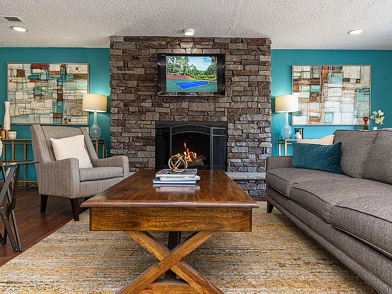 Experience relaxation in a beautifully designed living room with modern comforts.