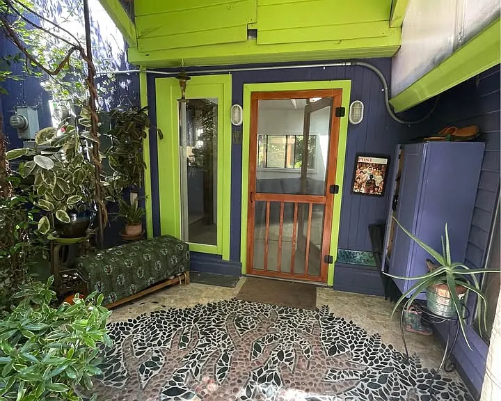 tree tile mosaic at front door
