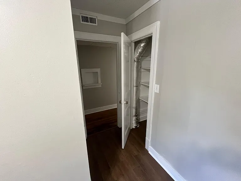 Kitchen pantry and hallway to bedrooms