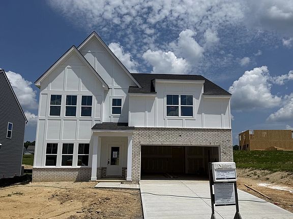 Exterior - Earthy tones and clean lines feel quietly inviting.