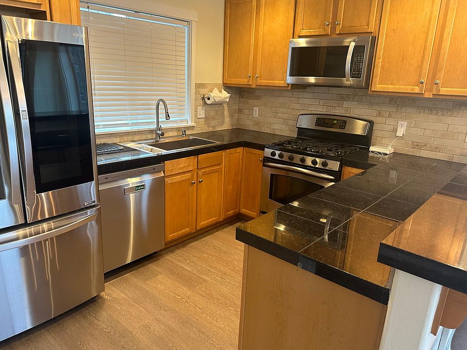 Kitchen with upgraded appliances. Tons of storage.