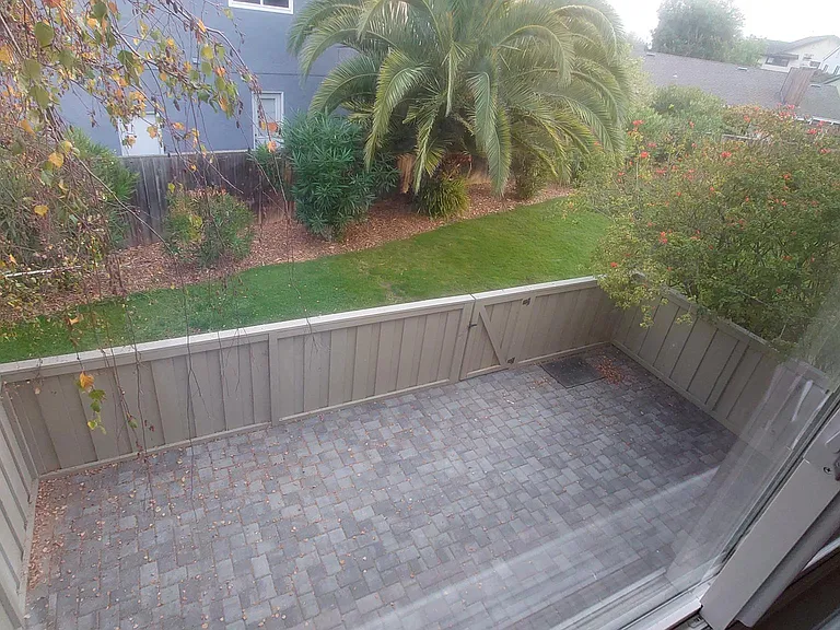 Top view of the Patio, with access to adjacent common greenbelt maintained by the HOA.