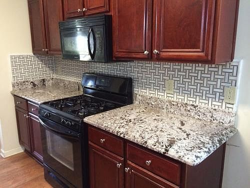 Granite Counter Top with Marble Backsplash
