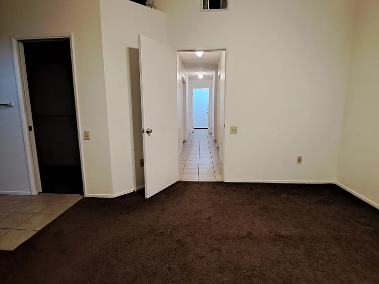 View from primary bedroom to hall.