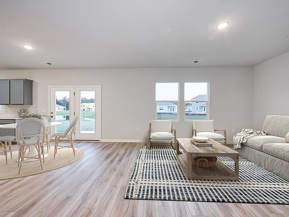 Lounge in the large Gathering Room, perfect for relaxing. - Model Representation