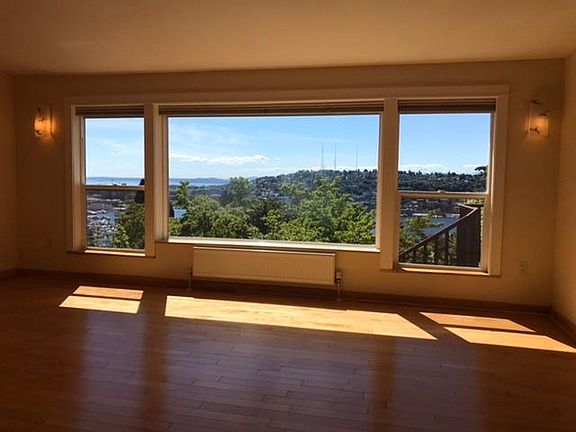 Living room with motorized sunshade